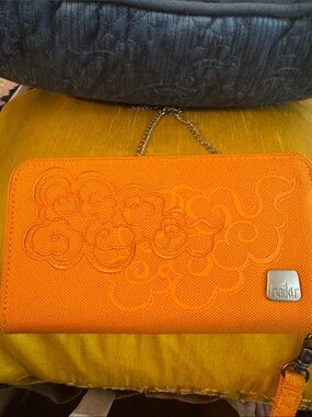 Haiku Orange Floral Embossed Wristlet with Chain Strap